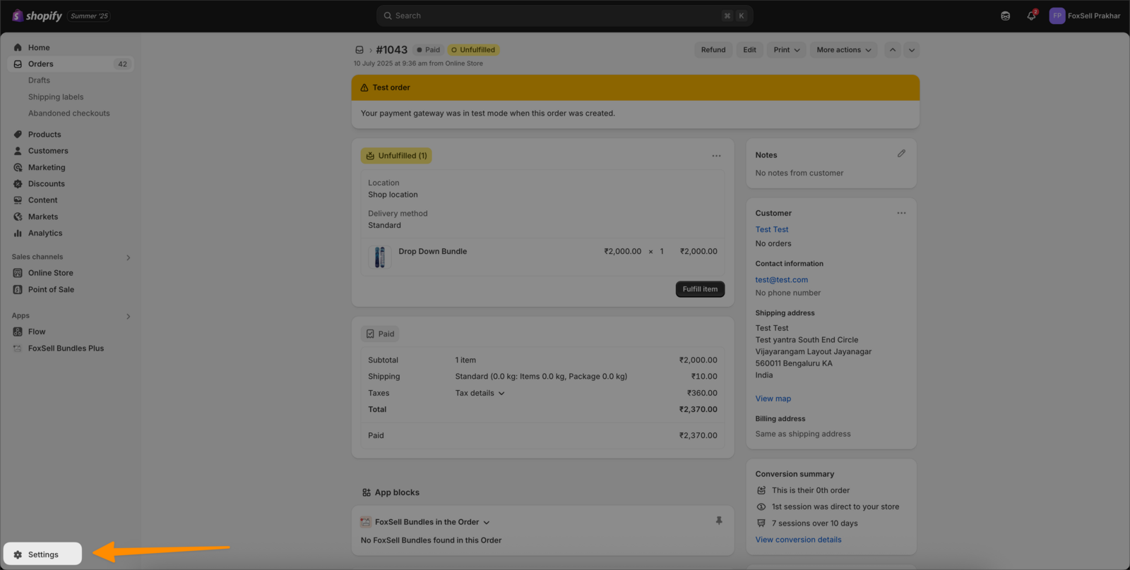 Shopify admin highlighting the Settings button