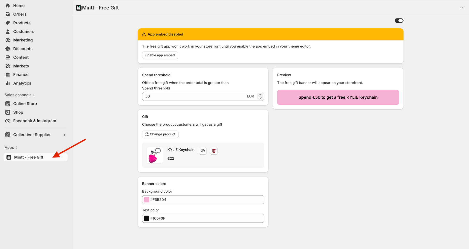 Shopify admin with a red arrow pointing to the Mintt - Free Gift app