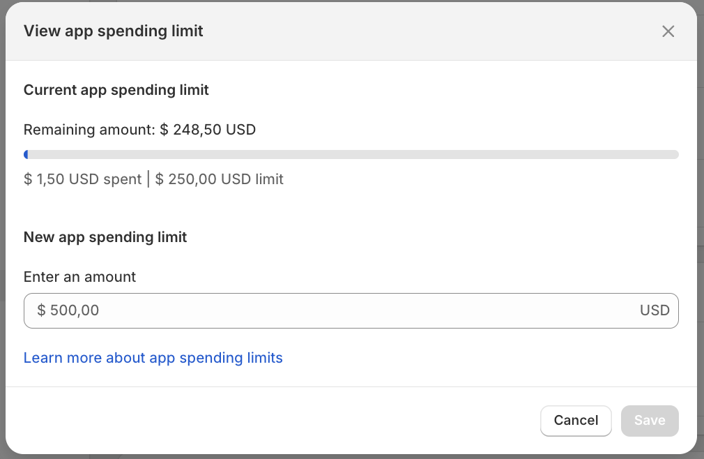 Shopify 'View app spending limit' dialog showing current limit, remaining amount, and an input field for a new app spending limit with Save and Cancel buttons